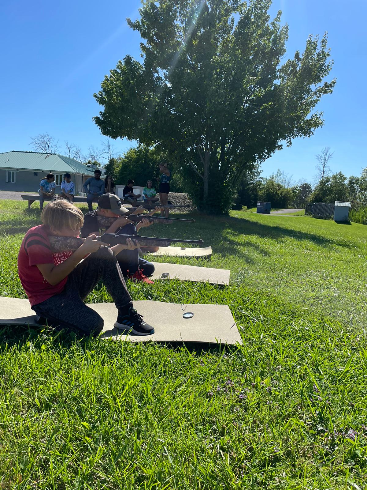 Campers take part in air rifle target practice
