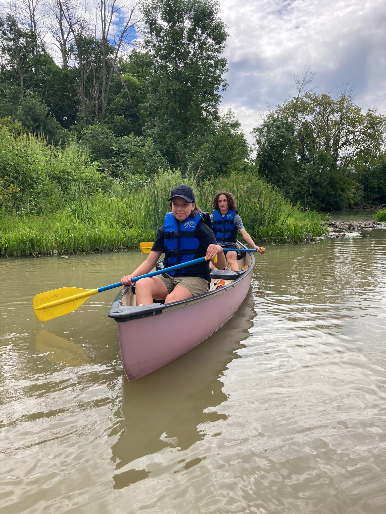 Paddling in a canoe
